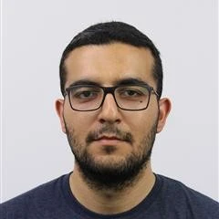 Half body picture of Mert Kalender